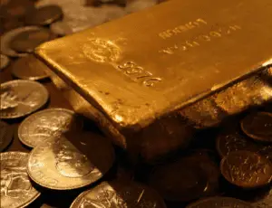 Gold bar on top of gold coins in Atlanta, GA